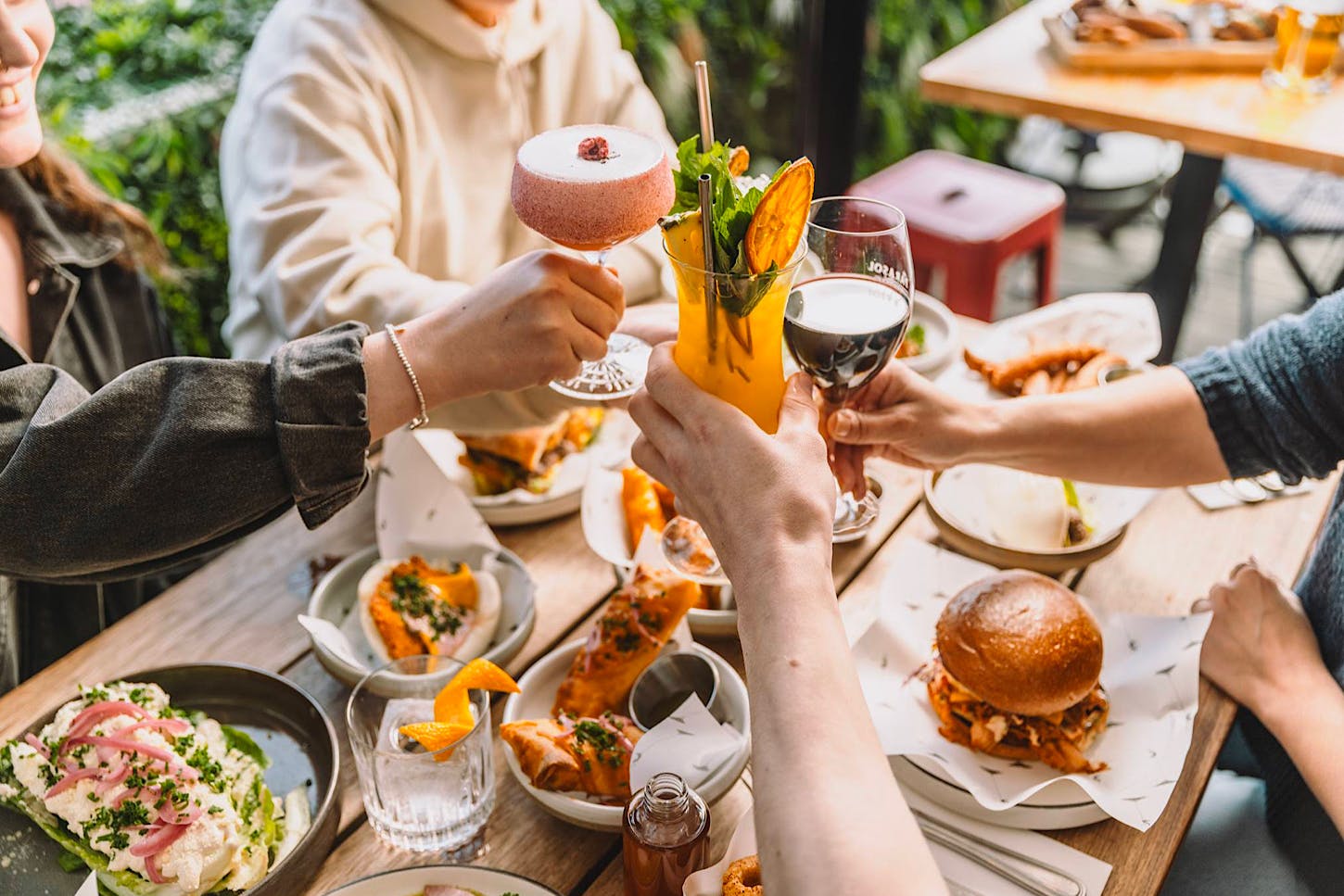 A group toast Parasol & Swing as one of the best bars in Auckland.